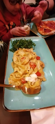 Trattoria Pizzeria Amici - Gastronomie und Hotellerie