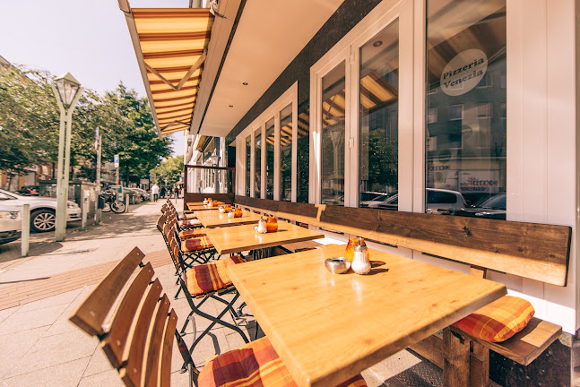 Pizzeria Venezia Rü - Gastronomie und Hotellerie