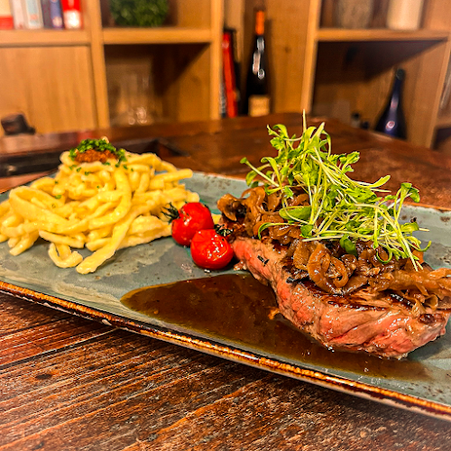 Stadthotel Waldhorn | Restaurant Holz & Feuer