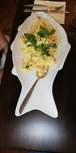 Trattoria Pizzeria Amici - Gastronomie und Hotellerie