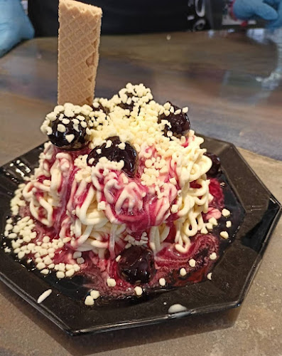 Eiscafé Del Longo - Gastronomie und Hotellerie