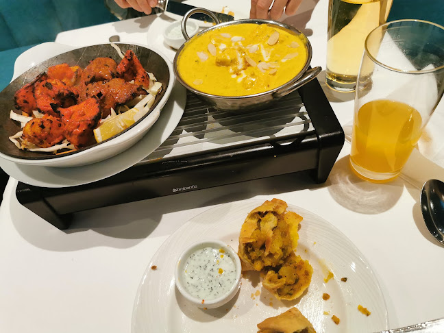 Taj Tandoori - Gastronomie und Hotellerie